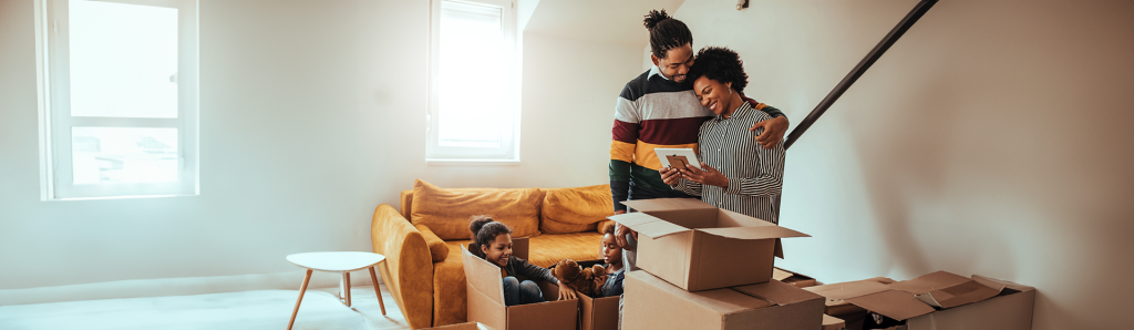 Co-parents with children enjoying quality time together, just before a move which required modifying their parenting plan.